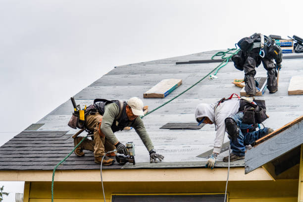 Professional Gutter Installation technician working in Fort Washington, PA